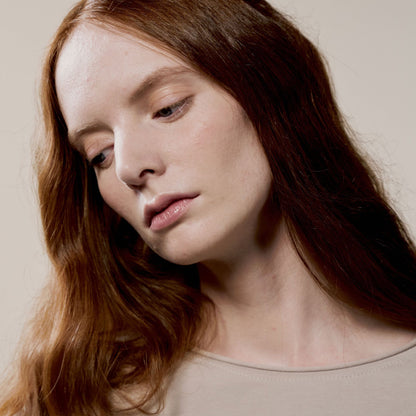 Corrective foundation 100R Rosy Porcelain